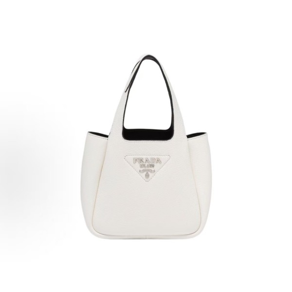 PRADA, a white women\'s handbag with a metal engraved logo and magnetic clasp, featuring a shoulder strap and a vegetable basket